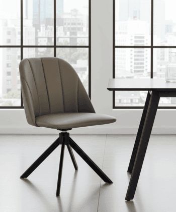 The Maja Modern Swivel Dining Chair with Channel Back