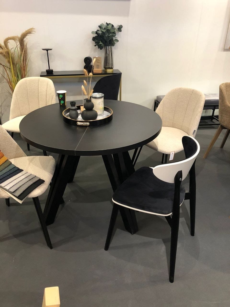 The Marco Modern Extendable Black Round Dining Table 100 to 180CM