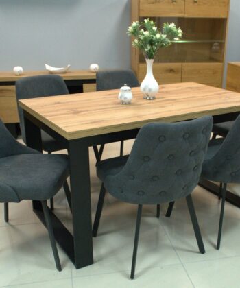 Modern dining table with six upholstered chairs in a stylish home interior.