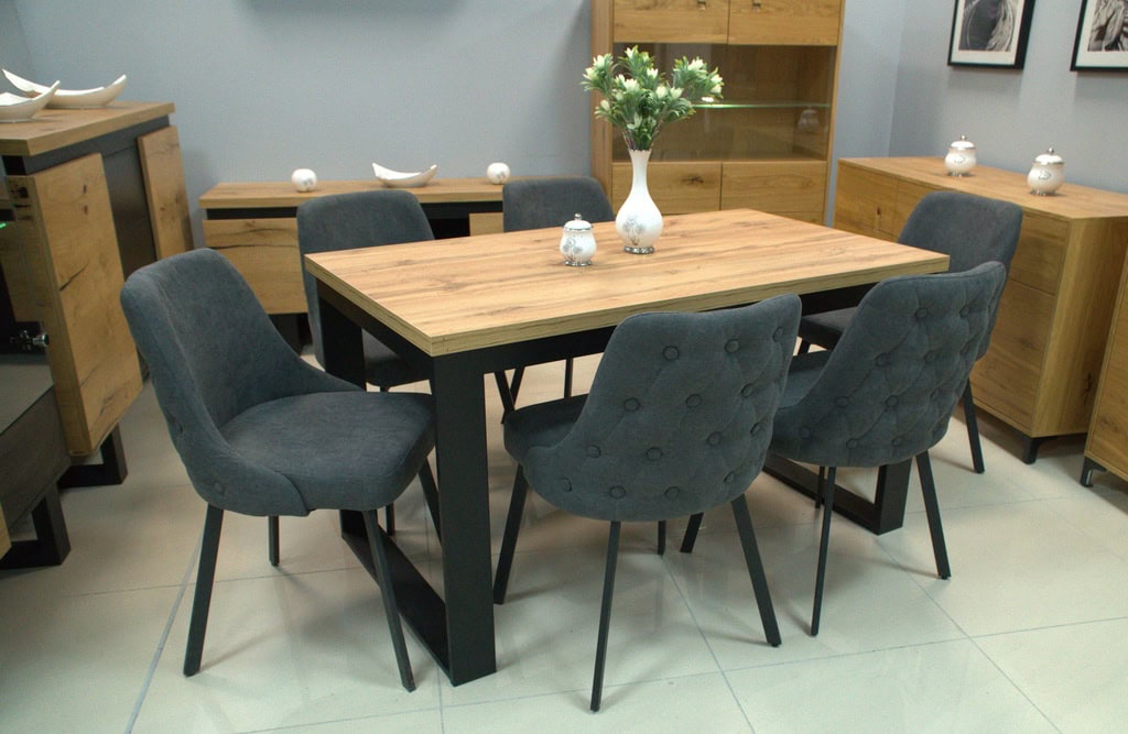 Modern dining table with six upholstered chairs in a stylish home interior.