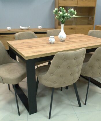 Modern wooden dining table with six upholstered chairs in a stylish home setting.