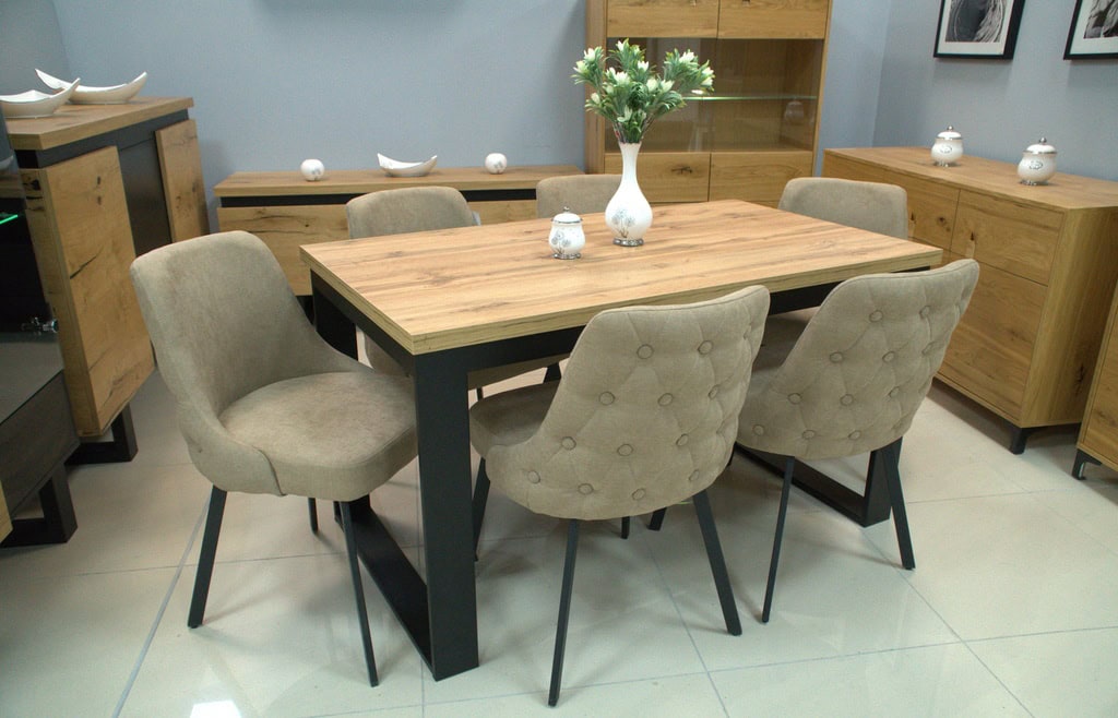 Modern wooden dining table with six upholstered chairs in a stylish home setting.
