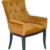 Soft mustard velvet armchair with black wooden legs, stylish and comfortable for living room decor.