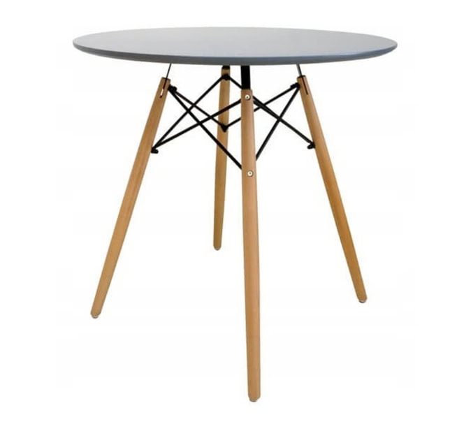 Modern round wooden table with black metal supports, ideal for contemporary home decor.