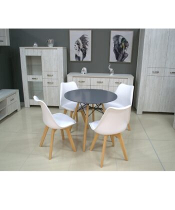 Modern white pouffe and chairs set in stylish living room decor.