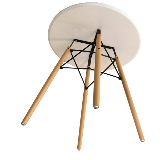 Modern round white table with wooden legs and black metal support structure.