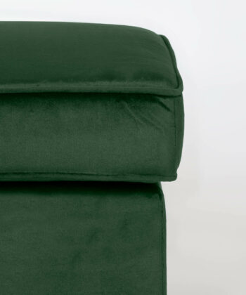 Soft green pouffe with plush fabric, ideal for modern living room decor.